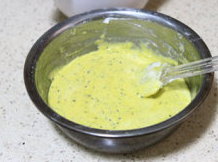 7、黑芝麻肉松蛋糕卷,用刮刀切拌均匀