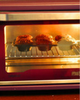 8、巧克力杏仁麦芬蛋糕,送入预热160度的烤箱，烤30分钟左右