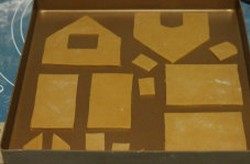 11、姜饼屋,把切割好的面片放在烤盘上（尽量不要变形）