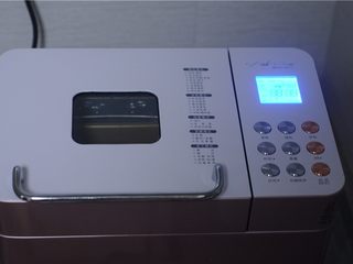 6、能量满满，南瓜红豆芝麻斑纹土司,设置两个揉面程序，将面团揉好