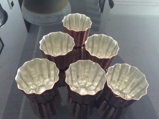 6、可露丽一一天使之铃,模具均匀地抹上黃油