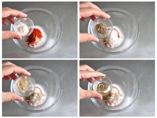 6、香酥脆皮炸鸡,继续加入大蒜粉、黑胡椒粉、白胡椒粉和料酒。