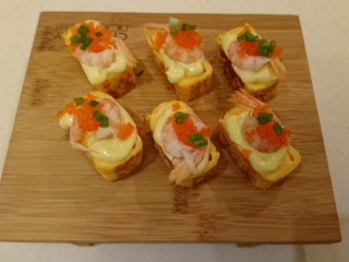 19、魚籽海鮮燒,再用蔥花做點綴。