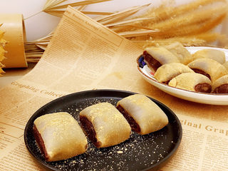 24、驴打滚,装盘即可食用。