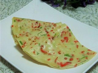 12、胡萝卜鸡蛋饼,香软的胡萝卜鸡蛋饼，配上豆浆或稀饭，好舒服的早餐呀