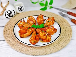 14、新奥尔良烤鸡腿,取出装盘，撒上葱花。