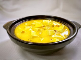 14、蟹黄豆腐南瓜羹,装盘。