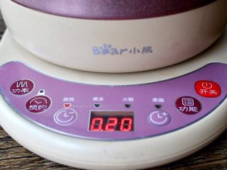 10、燕麦南瓜饭,按“蒸炖”功能