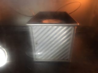 41、中种葡萄干吐司,烤箱预热200度，转180度烤35分钟，中间加盖锡纸