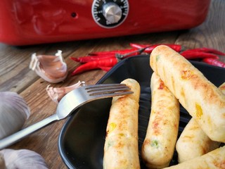 19、香煎鸡茸玉米肠,香煎鸡茸玉米肠出锅。