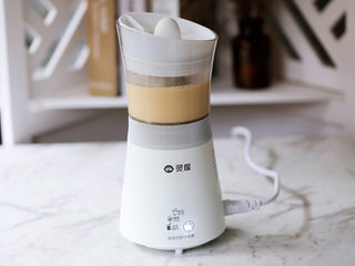 11、芋泥波波奶茶,盖上茶网,启动奶茶功能开始制作奶茶,大约25分钟后,奶茶制作完成