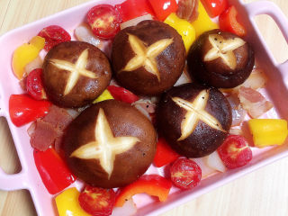 13、孜然烤香菇,将食材放入烤盘中。