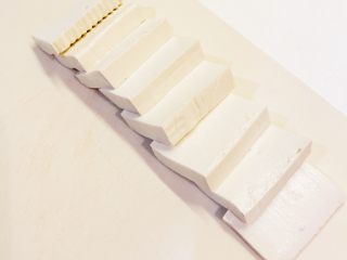 1、特制番茄酱煎豆腐,把嫩豆腐切片