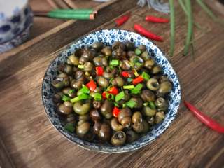 14、酱爆螺蛳 ,咸鲜入味，味道鲜美的螺蛳。