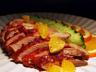 24、橙香红糟鸭脯,一盘可热可凉吃的菜肴上桌了