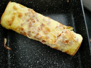 14、菜脯蛋卷,大概十五秒即可卷成条状盛出盘中