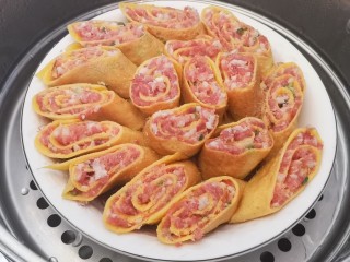 15、年味~树花菜蒸蛋卷,放入蒸锅中大火蒸20分钟即可