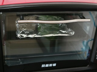 20、≈蒜香烤排骨≈烤箱版,放入预热好的烤箱，230度上下火，20分钟