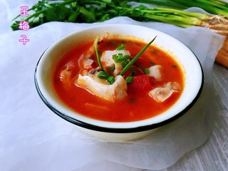 7、番茄鱼,盛盘中撒葱花即可。