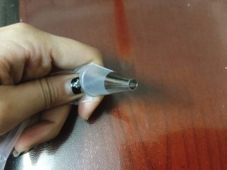 3、蛋黄溶豆 宝宝健康辅食,裱花袋先装入裱花头，备用。