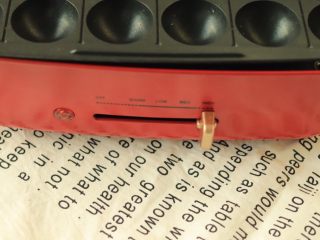 5、香蕉蛋糕球,美食锅换章鱼烧烤盘，最高温预热至红灯灭