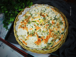 11、韭菜粉条薄饼,表面酥脆，很漂亮哦~切开看看