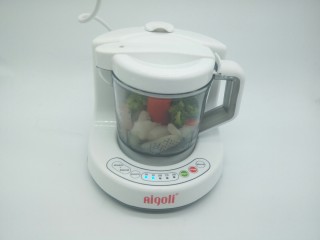 9、【宝宝辅食】鳕鱼什锦糊,打开辅食机蒸煮键，都是易熟的，所以按15分钟就可以，再按开启键，等待就可以，