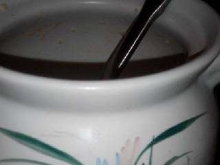 3、苹果小米粥,砂锅了里加水烧开后下去小米，