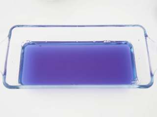 4、星空果冻,将步骤2的深色溶液倒入容器中，放入冰箱冷却至凝固