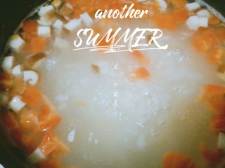 8、番茄肉末粥,去除浮沫后，如图所示，就准备放入肉末