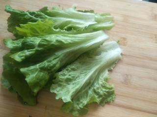 10、生菜鱼片粥,生菜切丝