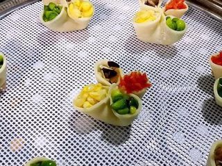 12、四喜饺子，让生活喜气洋洋,开水上锅，大火蒸十分钟即可。