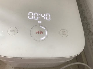 12、玉米南瓜粥,把锅放入电饭煲中，按煮粥键煮40分钟