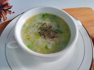 12、补锌-贝类鲜味粥,撒入牡蛎黑芝麻粉提味即可食用