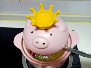 7、苹果小米粥,转小火煮