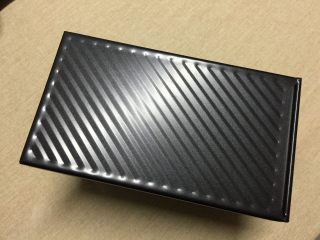 13、全蛋吐司-黑金刚吐司,取出后移除保鲜膜,合上盖子,继续发酵5分钟至9分满(拉开盖子时有阻力即可)