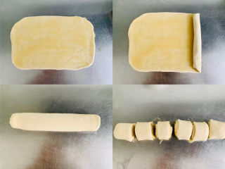 7、发面油酥小糖饼,将油酥均匀涂抹等候，从一侧卷起，平均分成六等份。