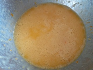 5、橙香甜甜圈（植物油版）,再次用手动打蛋器搅拌均匀。