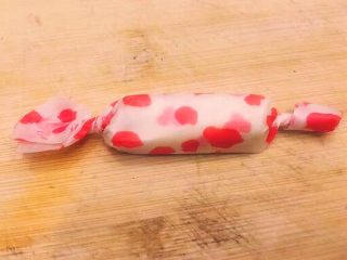 16、花生糖牛扎糖,俩头扭起来，扭紧一点