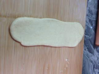 9、橙香燕麦吐司,再擀开