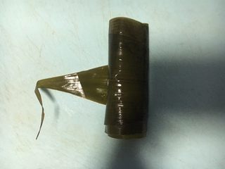 11、五彩糯米排骨卷,成为一个圆柱体