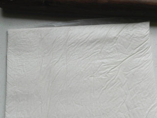 10、北京奶酪卷,装入保鲜袋中，用擀面杖擀平