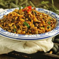 萝卜干炒蚬肉麻辣风味