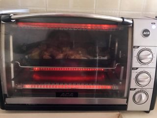 21、烤香辣鳕鱼,再把烤盘放入烤箱，继续烤制20分钟即可