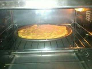 6、咖啡酒柠香椰丝蛋糕,预热烤箱后，放入中层180度20分钟