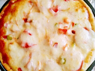 21、超长拉丝批萨,烤箱预热，上下火,上火160,下火180烤半个小时左右，每个烤箱不一样，视个人情况而定。