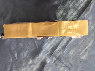 11、芝士焗紫薯,把芝士片一分为二，放到紫薯上