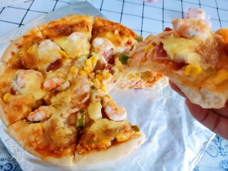 22、虾仁培根披萨,趁热切块，拿起来能看到拉丝
