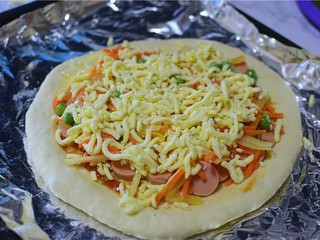 11、火腿披萨,再放一层马苏里拉