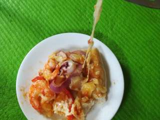 30、海鲜披萨10寸,如果正常的话，芝士是可以如此进行拉丝的